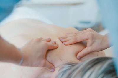 Man Massaging a Woman
